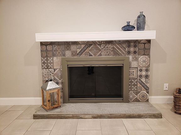 A great room center piece wood burning fireplace