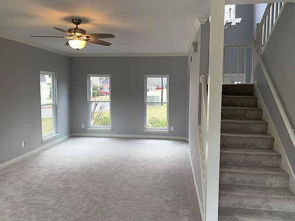 Living room and stairway to second level