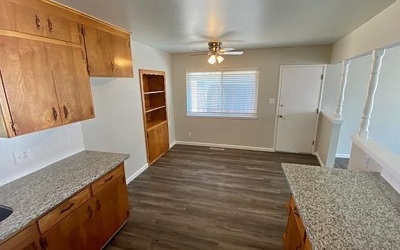 Granite and dining area with built in china cabinet