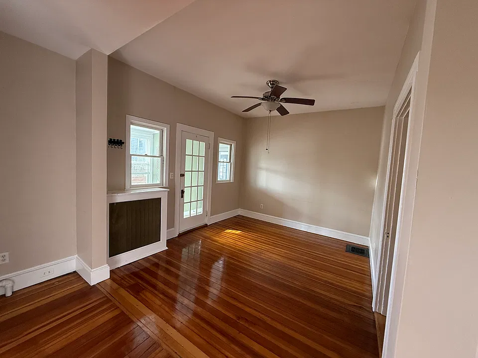 Large living room with ceiling fan