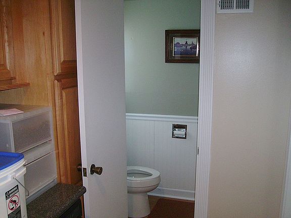1/2 bath off kitchen