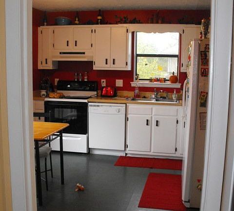 kitchen is to your immediate left as you come through front door