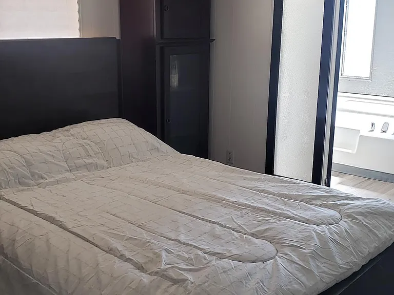 Master bedroom with new mattress __ and entrance into bath