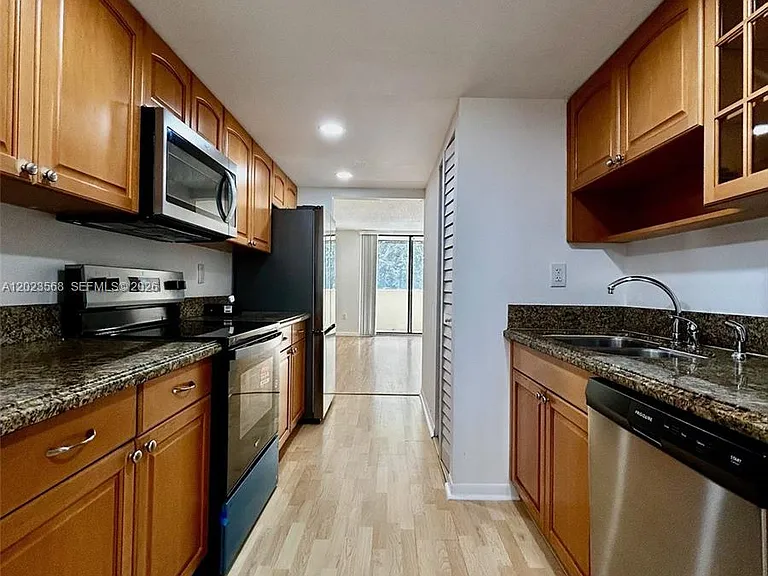 7451 NW 16th St #304 — Photo 1