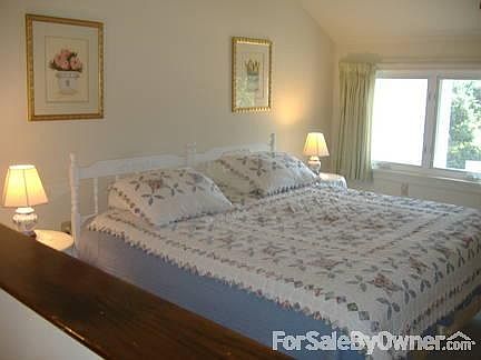 Upstairs master
						:
						Second bedroom En-suite bathroom has a garden tub with skylight.