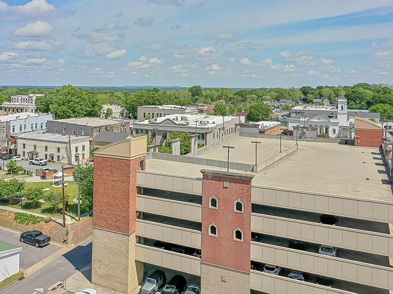 Amp Park & free public parking deck next to building