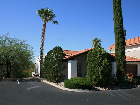 view to townhouse with guest parking