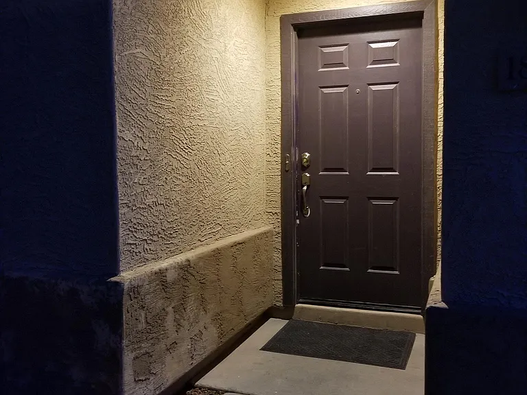 Front door has been painted.