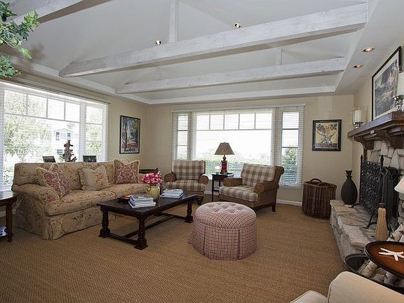 Living Room w/ Vaulted Ceilings & Fireplace