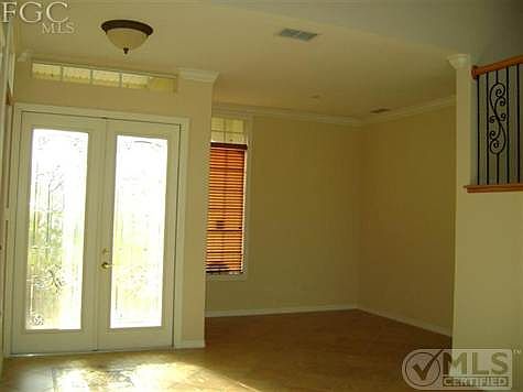 looking back at living room and front door