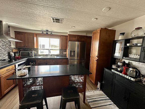 3rd image of 9302 E Broadway Rd #20