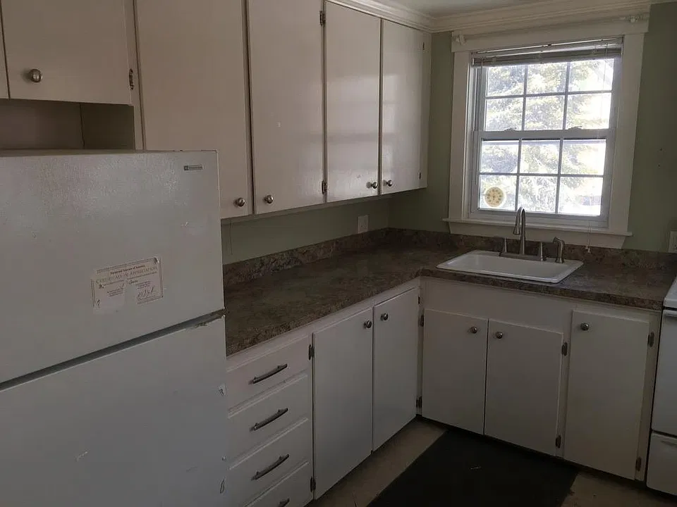 After this photo was taken, new refrigerator and stove have been installed.