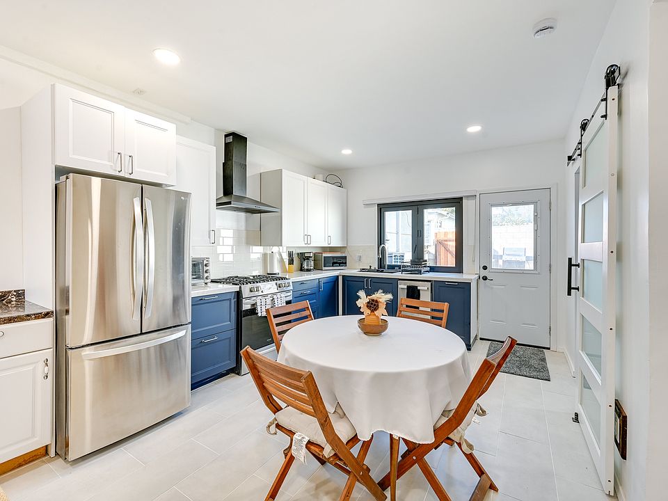 Kitchen with access to backyard