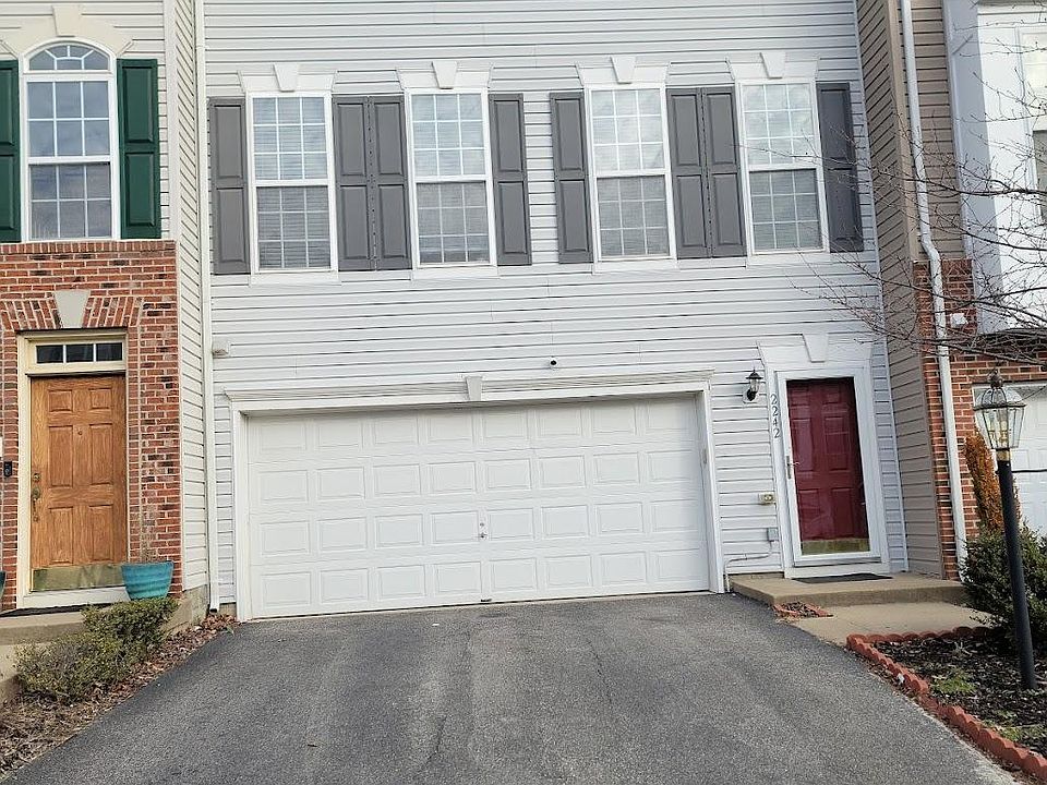 Front View - Two Car Garage with space for 2 additional cars in Driveway