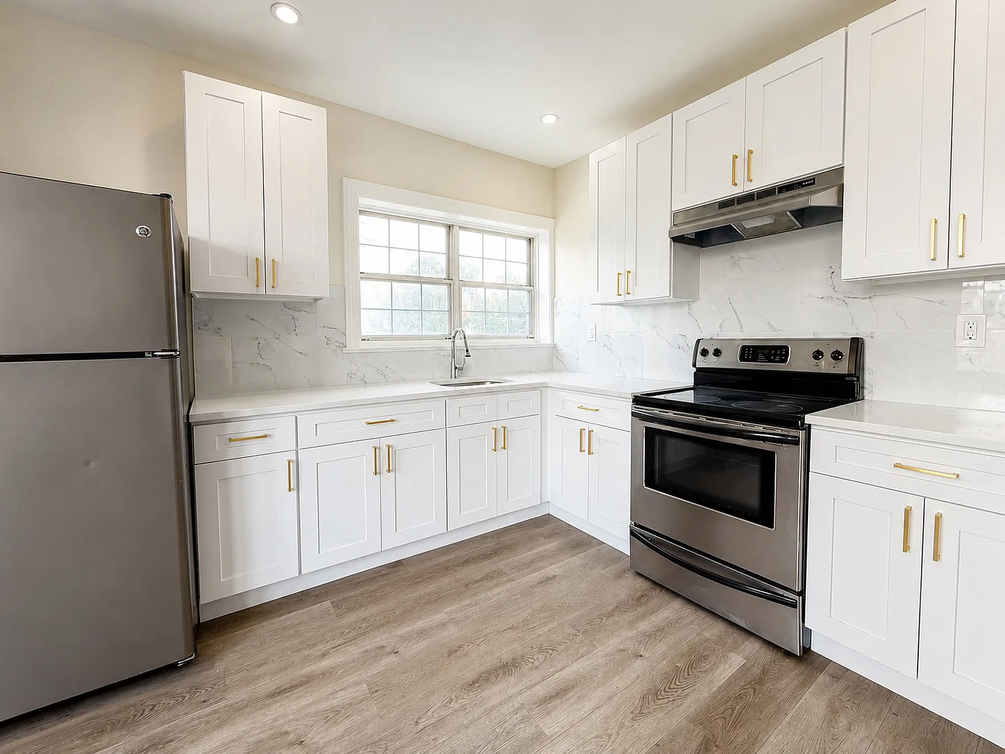 Second-Floor Three-Bedroom Unit with In-Unit Laundry — Photo 3