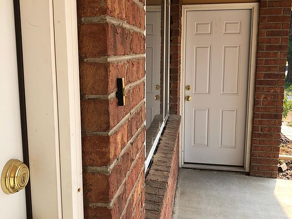 Front door on left. Access to garage straight ahead.