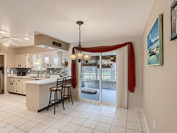 5th image of 10736 W VENTURI Drive NW