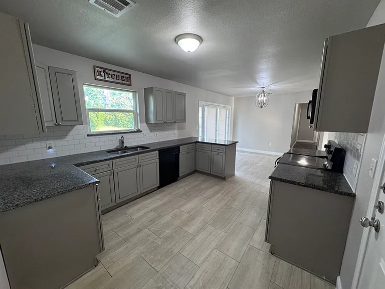 Photo from a previous listing. Tenant is currently occupying the Home.