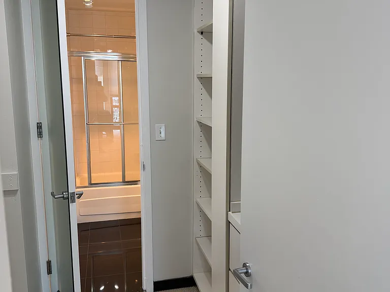 Walk in closet into Bathroom