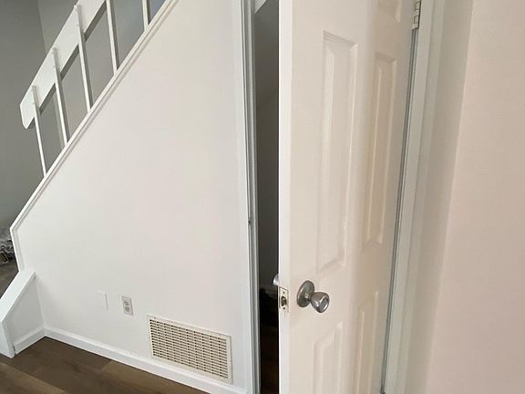 Large storage closet under the stairs