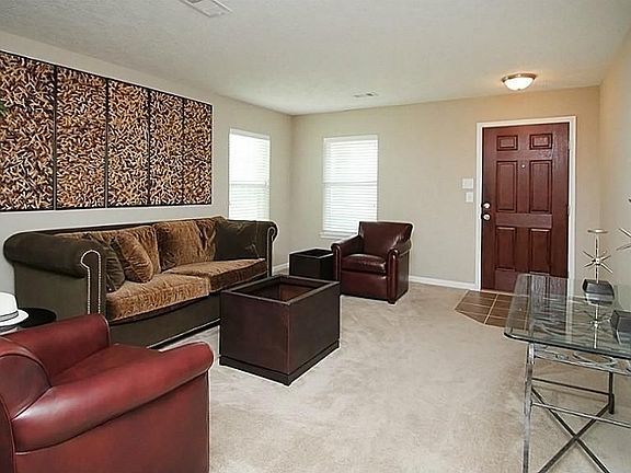 Enter into this very spacious formal living room.