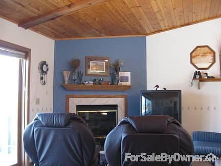 Main floor open concept living room.
						:
						The open living room/dining room creates a space that is great for entertaining.