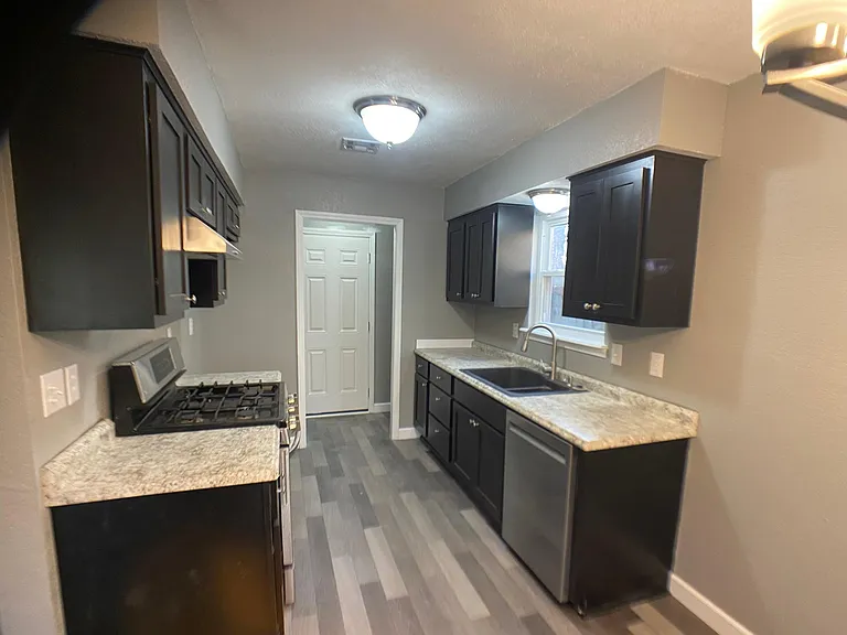 Kitchen, looking into indoor laundry