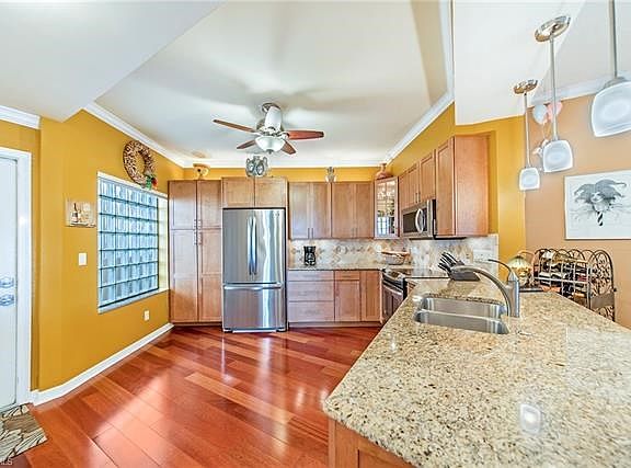 Kitchen view toward entrance.