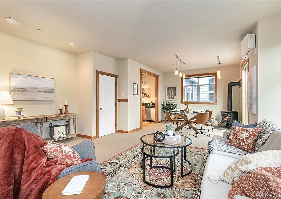 Sunny, bright living room, dinning room and kitchen