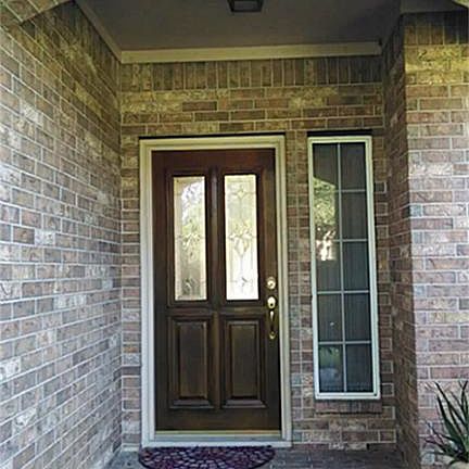 Welcoming Arched Entry to Brick Porch