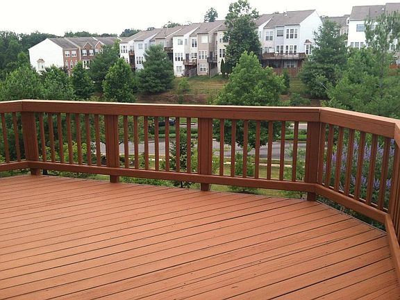 Deck on second-floor with lots of privacy. Trees have grown even larger.