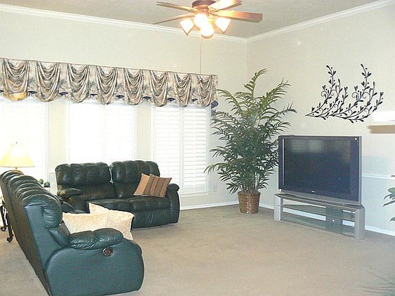 LIVING ROOM LOOKING TOWARD BACK OF HOUSE