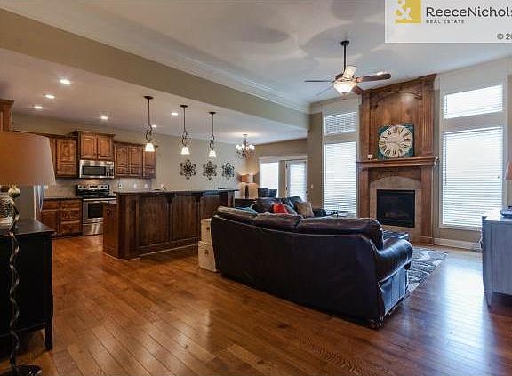 Wide oak plank floors and tons of floor to ceiling windows only