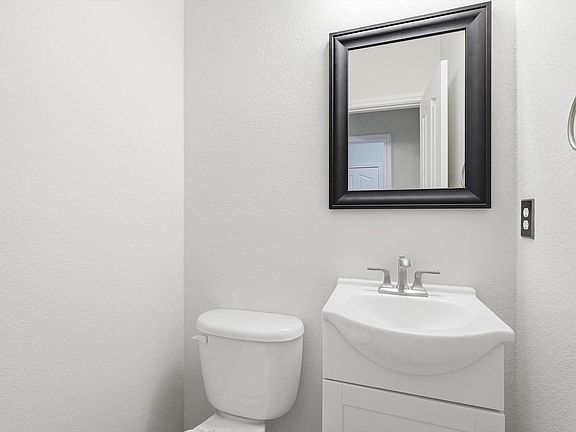 And on your right, the half bath that serves the first floor recently refurbished