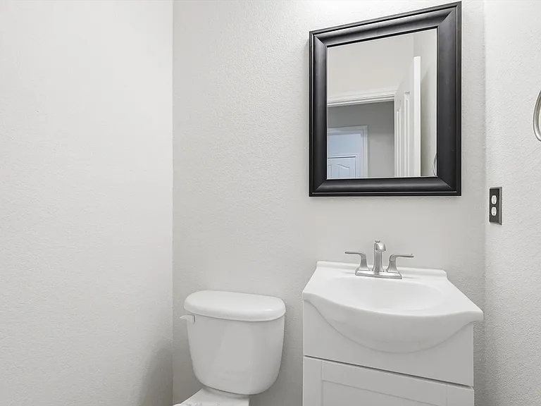 And on your right, the half bath that serves the first floor recently refurbished