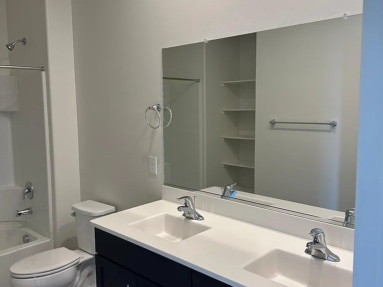 Third bathroom with double sink