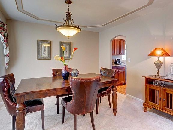 Formal Dining Room with tray ceiling