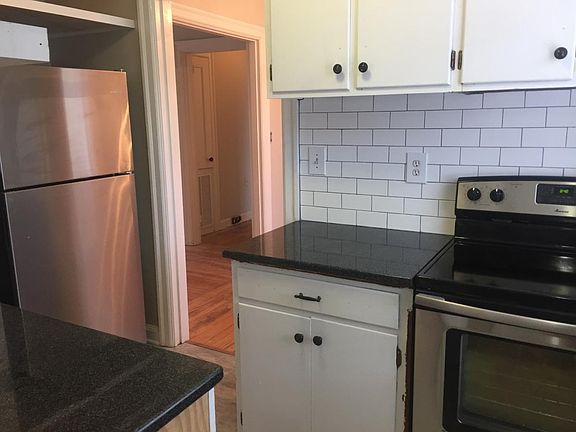 new stainless fridge and granite counter tops