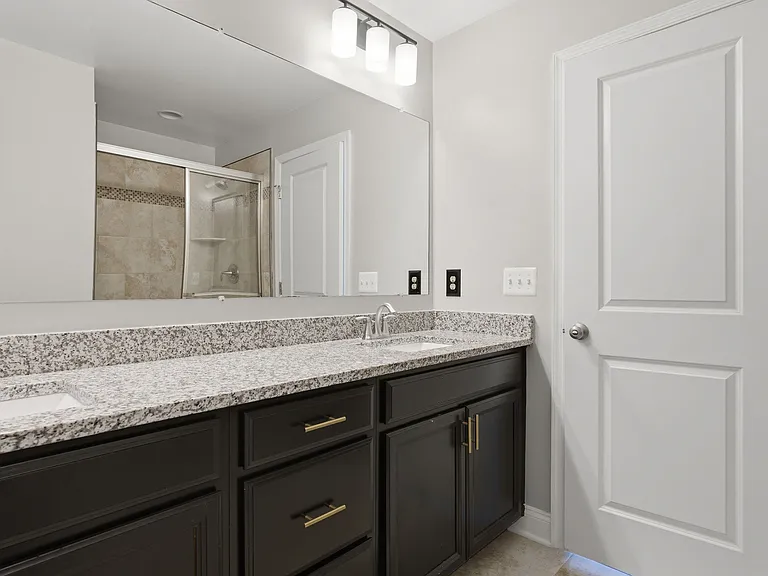 3rd-floor primary bedroom full bathroom