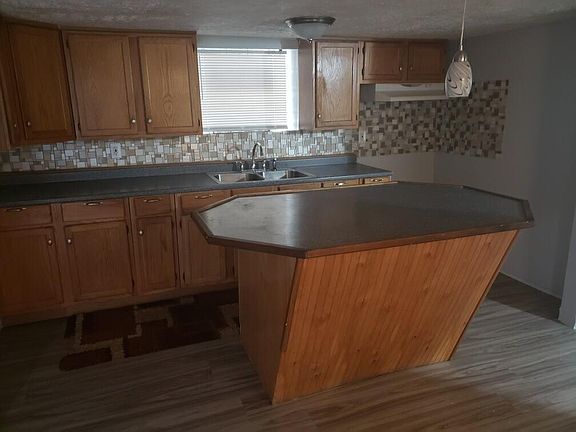 3rd image of 7711 S Constance Ave #Basement