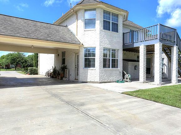 Plenty of room for all the vehicles and a basketball goal. The 3 car garage offers a epoxy floor.
