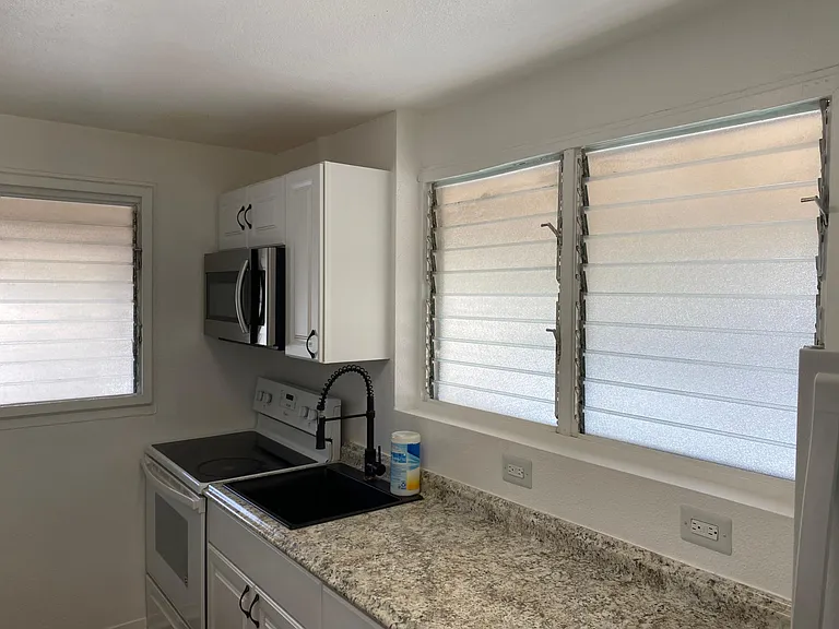kitchen with a lot of windows