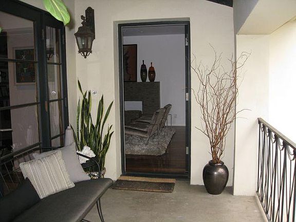 private patio leading to front door