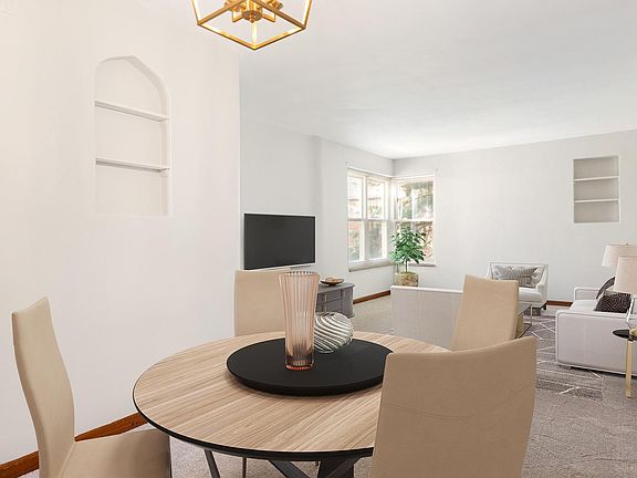 Cozy dining space with brand new elegant chandelier.