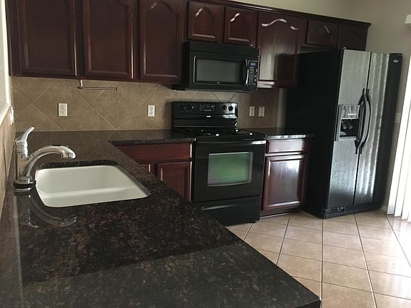 4th image of 8762 W Surrey Ave