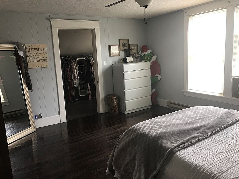 Another view of bedroom with adjacent walk in closet