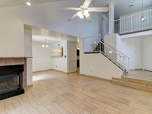 Living room with loft above