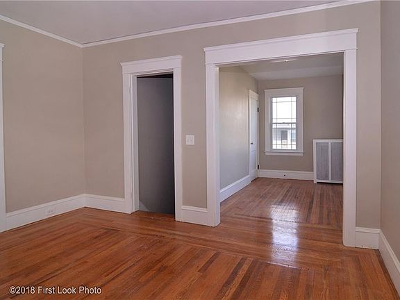 Top of the stairs leading to living room and office/flex space