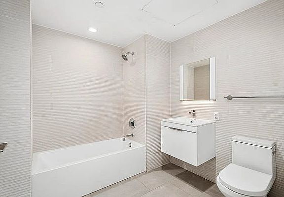 5th image of 306 W 142nd St APT 4D