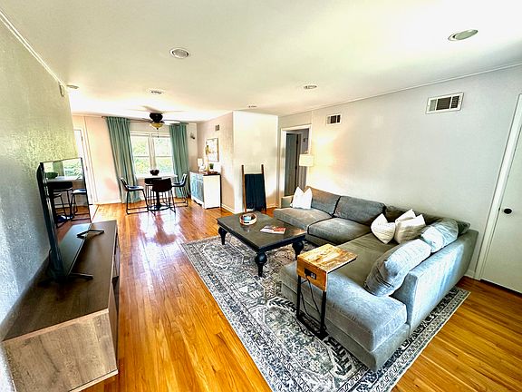 View from front door into living room and dining room.